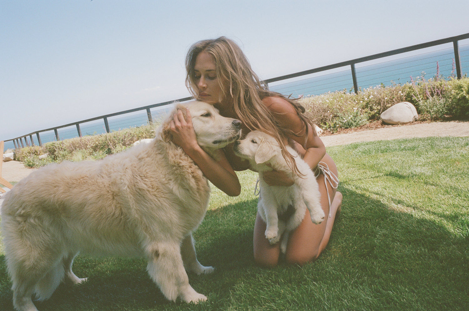 Francesca and Mackenzie outdoors by the ocean